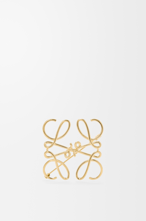 LOEWE Spilla Anagram in metallo Oro