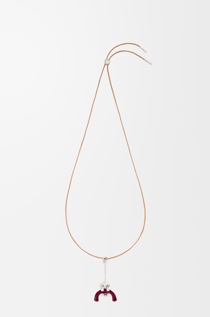 LOEWE Seated Acrobat pendant in sterling silver and crystals Silver/Burgundy