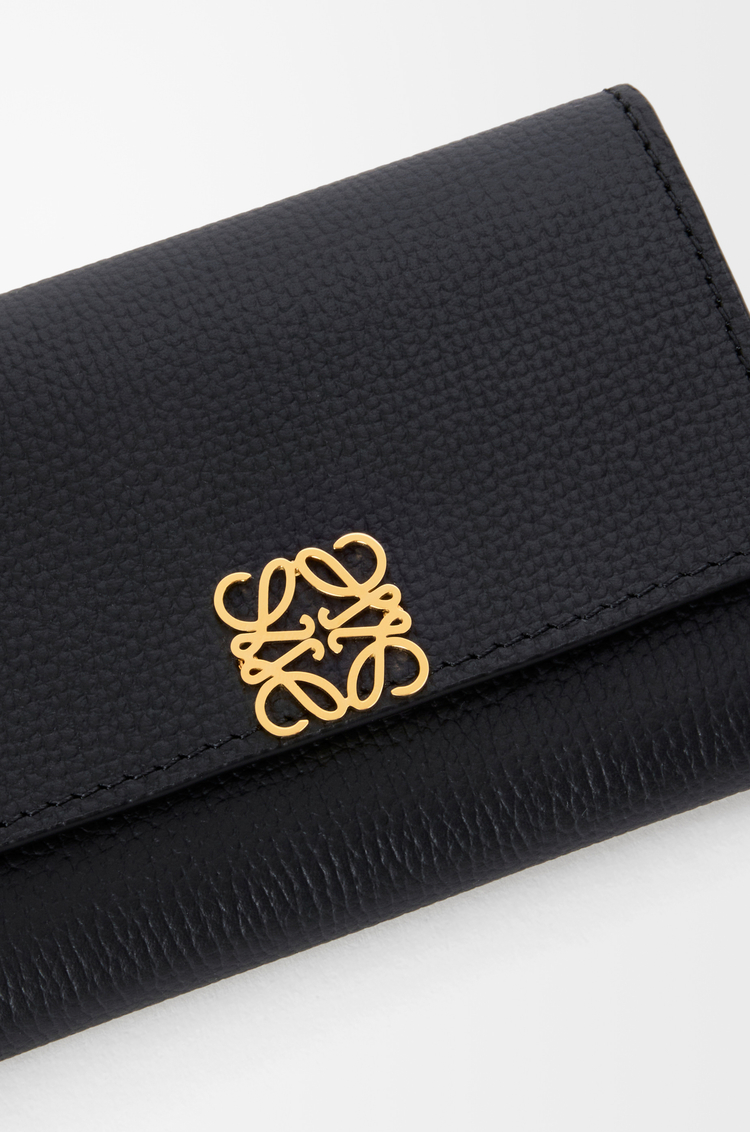 LOEWE Anagram small vertical wallet in pebble grained calfskin Black/Gold