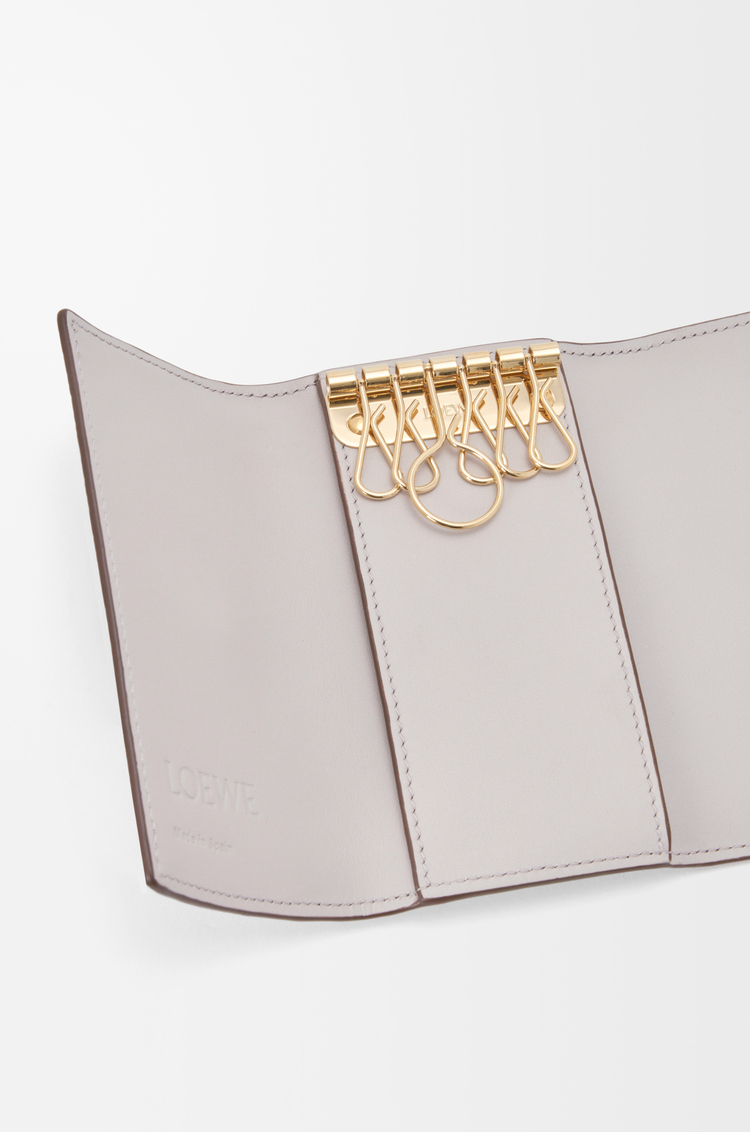 LOEWE Anagram key case in pebble grained calfskin Light Ghost Grey