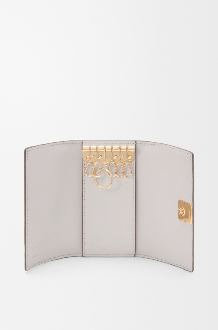 LOEWE Anagram key case in pebble grained calfskin Light Ghost Grey